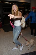 BELLA THORNE in Jeans Arrives at LAX Airport