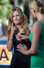 BELLA THORNE on the Set of Extra in Universal City