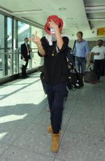 CARA DELEVINGNE at Heathrow Airport in London 0209