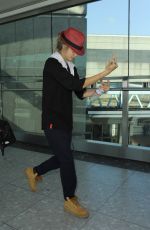 CARA DELEVINGNE at Heathrow Airport in London 0209