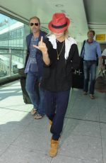 CARA DELEVINGNE at Heathrow Airport in London 0209