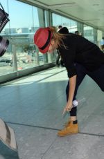 CARA DELEVINGNE at Heathrow Airport in London 0209