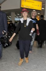 CARA DELEVINGNE at Heathrow Airport in London 0209