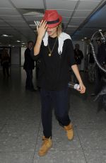 CARA DELEVINGNE at Heathrow Airport in London 0209
