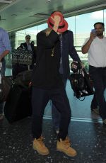 CARA DELEVINGNE at Heathrow Airport in London 0209