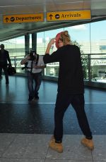 CARA DELEVINGNE at Heathrow Airport in London 0209