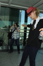 CARA DELEVINGNE at Heathrow Airport in London 0209