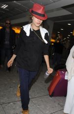 CARA DELEVINGNE at Heathrow Airport in London 0209