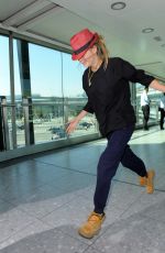 CARA DELEVINGNE at Heathrow Airport in London 0209