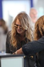 CARA DELEVINGNE at Pearson International Airport in Toronto