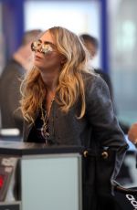 CARA DELEVINGNE at Pearson International Airport in Toronto