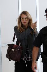 CARA DELEVINGNE at Pearson International Airport in Toronto