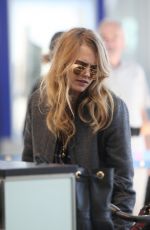 CARA DELEVINGNE at Pearson International Airport in Toronto