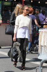 CHRISSY TEIGEN Out and About in New York