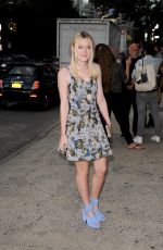 DAKOTA FANNING Arrives at a Fashion Show in New York
