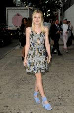 DAKOTA FANNING Arrives at a Fashion Show in New York