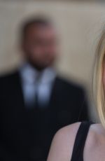 DAKOTA FANNING at Christian Dior Fashion Show in Paris