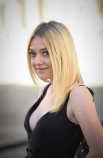 DAKOTA FANNING at Christian Dior Fashion Show in Paris