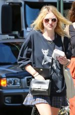 DAKOTA FANNING in Skirt Out and About in New York 1509