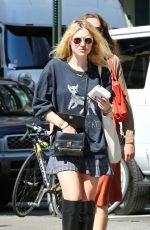 DAKOTA FANNING in Skirt Out and About in New York 1509