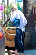 DAKOTA FANNING Leaves a Nail Salon in Studio City