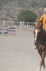 DAKOTA JOHNSON at Equestrian Center of Pantelleria in Italy