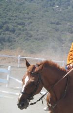 DAKOTA JOHNSON at Equestrian Center of Pantelleria in Italy