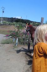 DAKOTA JOHNSON at Equestrian Center of Pantelleria in Italy