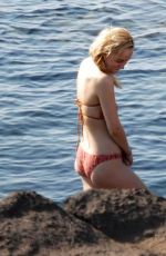 DAKOTA JOHNSON in Bikini at a Beach in Sicily