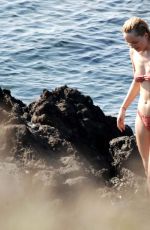 DAKOTA JOHNSON in Bikini at a Beach in Sicily