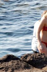 DAKOTA JOHNSON in Bikini at a Beach in Sicily