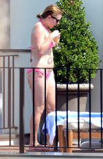 ELISABETH MOSS in Bikini at a Hotel Balcony in Capri