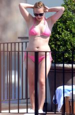 ELISABETH MOSS in Bikini at a Hotel Balcony in Capri