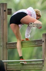 ELLIE GOULDING Working Out at a Park in London