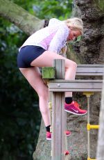 ELLIE GOULDING Working Out at a Park in London