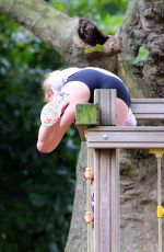 ELLIE GOULDING Working Out at a Park in London