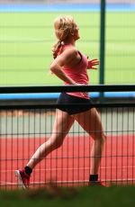 ELLIE GOULDING Working Out at a Park in London