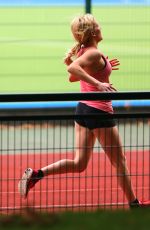 ELLIE GOULDING Working Out at a Park in London