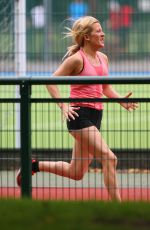 ELLIE GOULDING Working Out at a Park in London
