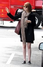 EMMA STONE Hailing a Cab in New York