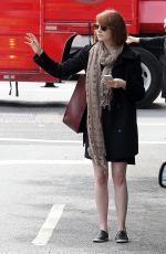 EMMA STONE Hailing a Cab in New York