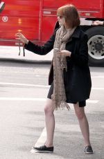 EMMA STONE Hailing a Cab in New York