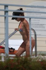 EVA LONGORIA in Bikini at a Pool in Miami