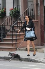 FAMKE JANSSEN Walks Her Dog in New York