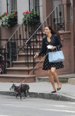 FAMKE JANSSEN Walks Her Dog in New York