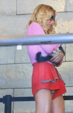 KESHA in Shorts at LAX Airport in Los Angeles