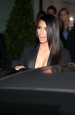 KIM KARDASHIAN Leaves Her Hotel in Paris