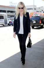 KIRSTEN DUNST Arrives at Los Angeles International Airport