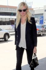 KIRSTEN DUNST Arrives at Los Angeles International Airport
