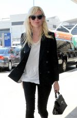 KIRSTEN DUNST Arrives at Los Angeles International Airport